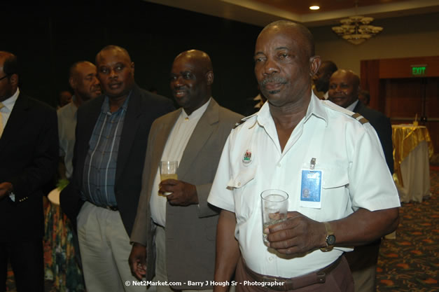 Red Cap Porters Awards - Minister of Tourism, Hon. Edmund Bartlett - Director of Tourism, Basil Smith - Friday, December 14, 2007 - Holiday Inn Sunspree, Montego Bay, Jamaica W.I. - Photographs by Net2Market.com - Barry J. Hough Sr, Photographer - Negril Travel Guide, Negril Jamaica WI - http://www.negriltravelguide.com - info@negriltravelguide.com...!