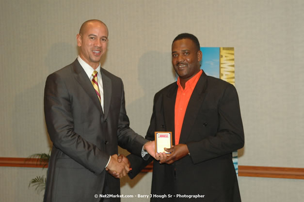 Red Cap Porters Awards - Minister of Tourism, Hon. Edmund Bartlett - Director of Tourism, Basil Smith - Friday, December 14, 2007 - Holiday Inn Sunspree, Montego Bay, Jamaica W.I. - Photographs by Net2Market.com - Barry J. Hough Sr, Photographer - Negril Travel Guide, Negril Jamaica WI - http://www.negriltravelguide.com - info@negriltravelguide.com...!